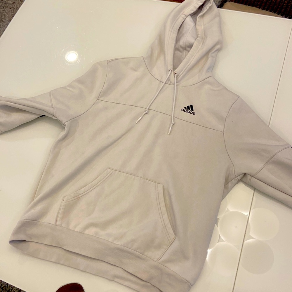 I am selling a comfy white Adidas sweater.